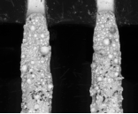 The SEM image of the failed connector solder joint (severe cavity).